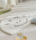 Clement Smiley Face Plush Accent Rug - Neutral Tones, Lofted Plush Pile with a Coated Grip Backing, Soft Bedside Mat