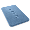 Coral Fleece Memory Foam Bath Mat in Blue on a white background