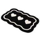 Tufted Heart Shape Bath Mat in Black on a white background