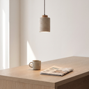 Rhea travertine pendant over a breakfast bar