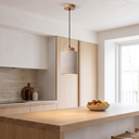 Rhea travertine pendant in light wood above a Nordic kitchen island
