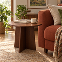 Astrid Nordic Round Side Table in the larger 19.7 inch size beside a sofa