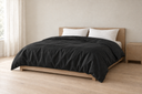 Lyocell Duvet Cover in Black styled in a bedroom