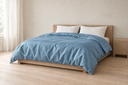 Lyocell Duvet Cover in Blue styled in a bedroom