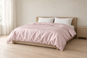 Lyocell Duvet Cover in Pink styled in a bedroom