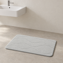 Diatomite Foam Bath Mat in Light Grey styled in a bathroom