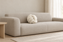 Knotted Ball Cushion in White styled in a living room