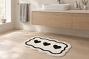 Tufted Heart Shape Bath Mat styled in a Nordic bathroom