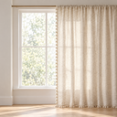 Natural Linen Tassel Curtain Panel styled in a living room