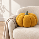 Nordic Pumpkin Shaped Cushion in Pumpkin Color styled in a living room