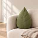 Leaf Shaped Pillow in Light Green styled in a living room